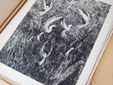 a picture of a black and white picture in a box
