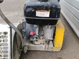 a small engine that is sitting on the side of the road