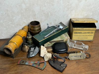 a lot of items that are on a wooden table