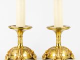 pair of brass candlesticks in the form of turtles