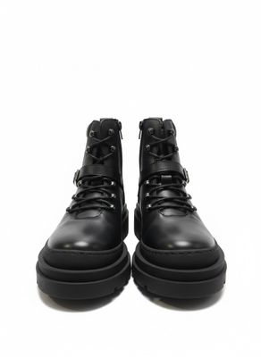 BORN - Ces bottes noires confectionnées en cuir et suède dis…