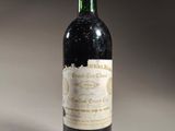 a bottle of wine that is sitting on a table