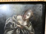 tableau représentant une femme tenant un oiseau dans ses bras