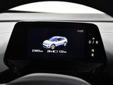 a picture of a car dashboard with a digital display