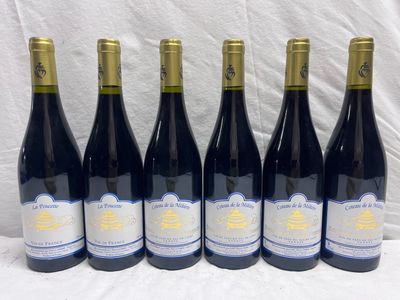six bottles of wine are lined up in a row