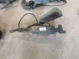several tools that are sitting on the floor next to each other