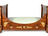 a dog bed that is made of wood and has a horse design on it