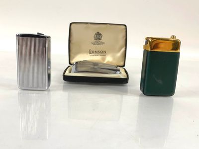 three different types of lighters are sitting on a white surface
