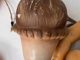 a clay figurine of an acorn on a table