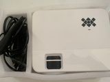 a white box that has a power cord attached to it