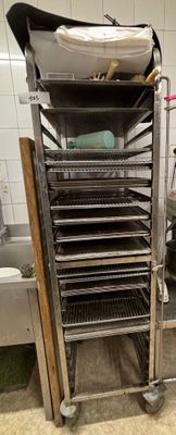 an image of a kitchen with a rack of trays