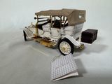 a model of a car that is sitting on a table