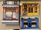 two paintings of a store front and a store front