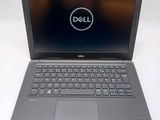 the dell laptop is open and ready to be used
