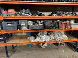 a shelf full of assorted items in a garage