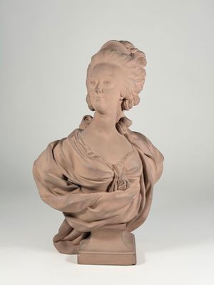 sculpture of a bust of a woman with a shaw around her neck