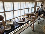 many plates of food on a table in a room