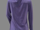 the back of a mannequin wearing a purple shirt and black pants