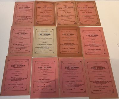 several pink menus are arranged on a white table top