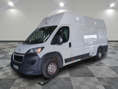 a picture of a white van parked in a room