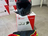 a helmet sitting on top of a box on the floor