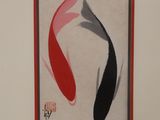 a picture of a painting of two fish in a red frame