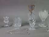 a lot of glass items that are sitting on a table