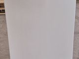 an image of a white refrigerator in a store