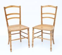 Paire de chaises en bois naturel style bambou, assise cannée…