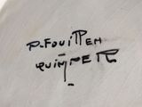 a close up of a white plate with writing on it