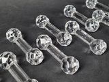 a lot of glass knobs that are on a table