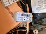 a bag of luggage with a price tag on it