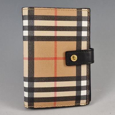 burberl checkered wallet with a black leather strap