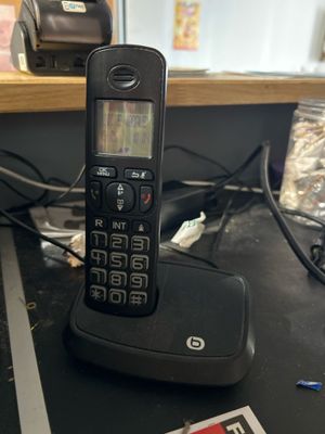 a cell phone that is sitting on a desk