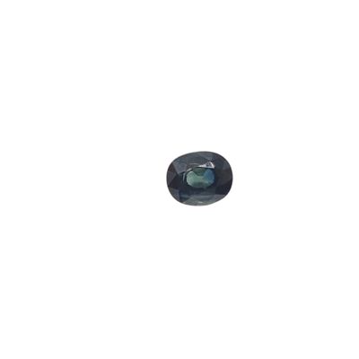a close up of a blue sapphire stone on a white background