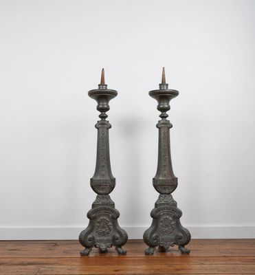 pair of antique cast iron candlesticks