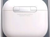 a white apple airpods sitting on top of a table