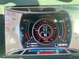 a picture of a car dashboard showing the speed of the car