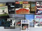 a lot of books on the table with pictures on them