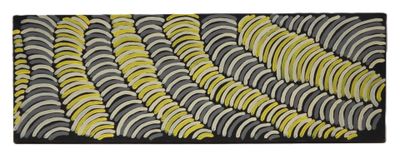 a close up of a black and yellow rug on a white background