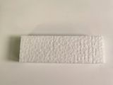a piece of white paper on a white surface