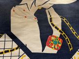 a picture of a woman holding a purse with chains on it
