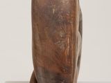 an image of a sculpture of a man ' s head on a white surface