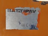 a piece of paper that has been torn off of the back of an orange truck