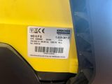 a label on the back of a yellow motorcycle