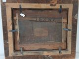 a picture of an old wooden frame with a tag on it