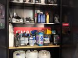 a black cabinet with a lot of items on it