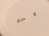 a close up of a plate with the word mello written on it