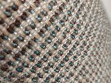 a close up view of a piece of fabric with a hole in it