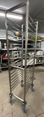 an image of a commercial kitchen with stainless steel racks